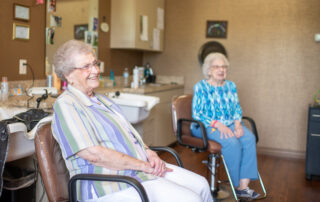 Two Elderly Women Getting their Hair Done - Kingsley Shores Senior Living Community